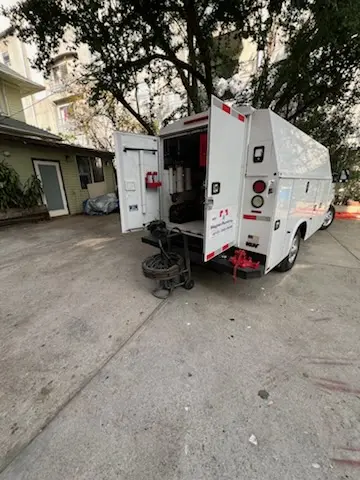 Magnet Plumbing service vehicle on-site for Grease Trap Cleaning in Mission Estates